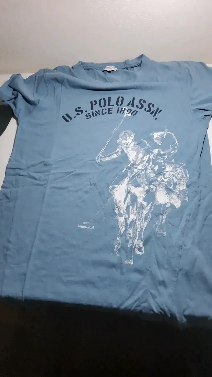 Polera azul U.S. Polo Assn. con diseño de jinete - 1