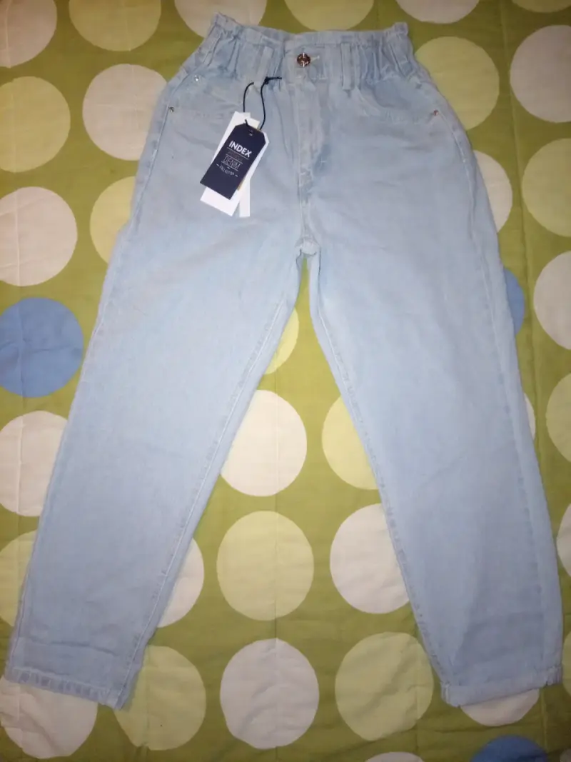 Jeans celestes de tiro alto para mujer Index