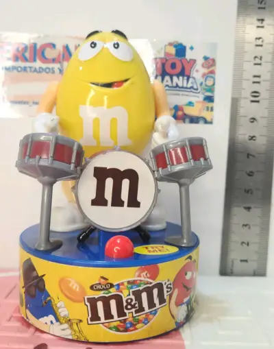 Figura musical M&M's amarillo con batería - miniatura 1