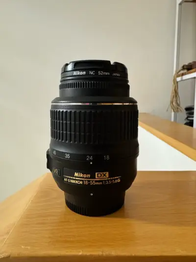 Lente Nikon AF-S DX 18-55mm VR en buen estado - miniatura 1