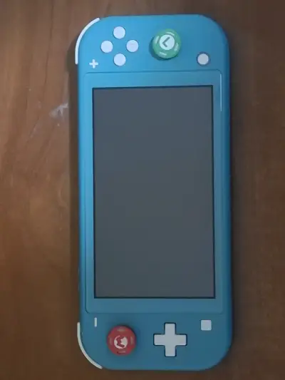 Nintendo switch lite turquesa - miniatura 1
