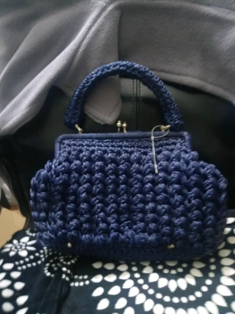 Cartera de mano - 1