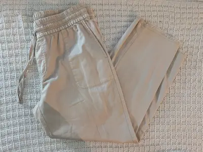 Pantalones beige de algodón para mujer - miniatura 1