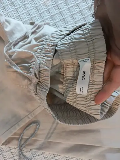 Pantalones beige de algodón para mujer - miniatura 2