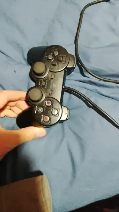 Se vende mando de ps2  buen estado - miniatura 1