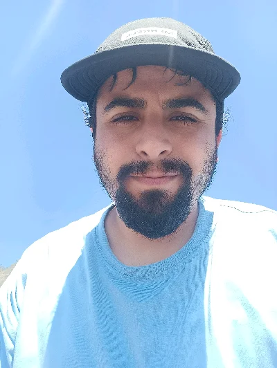 Luis E.