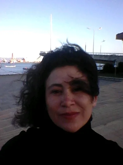 Ghislaine E.
