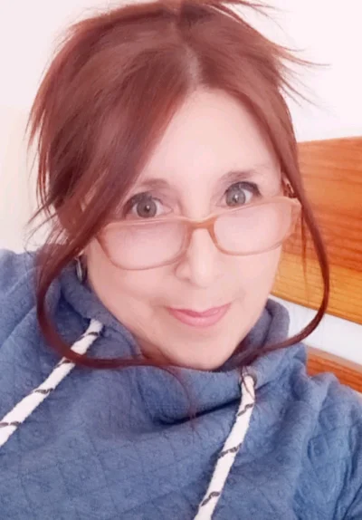 María E.