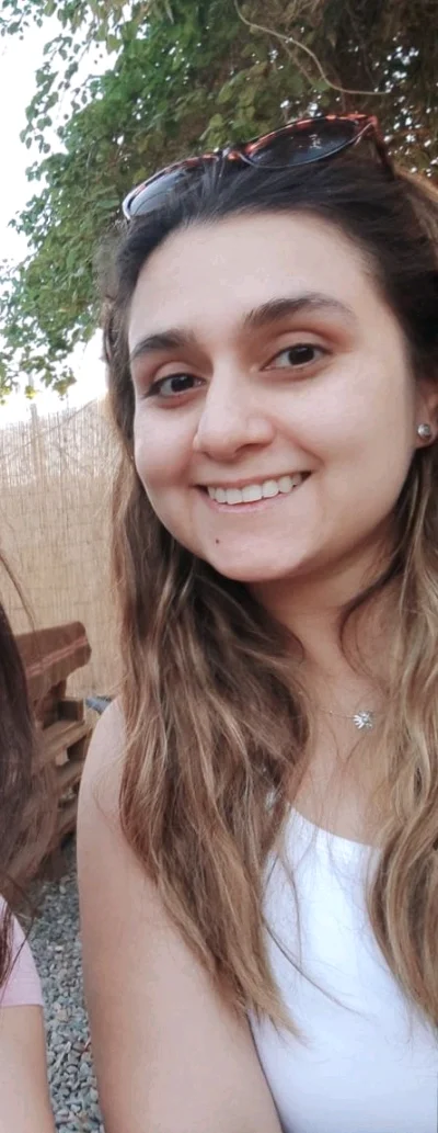 Corina A.