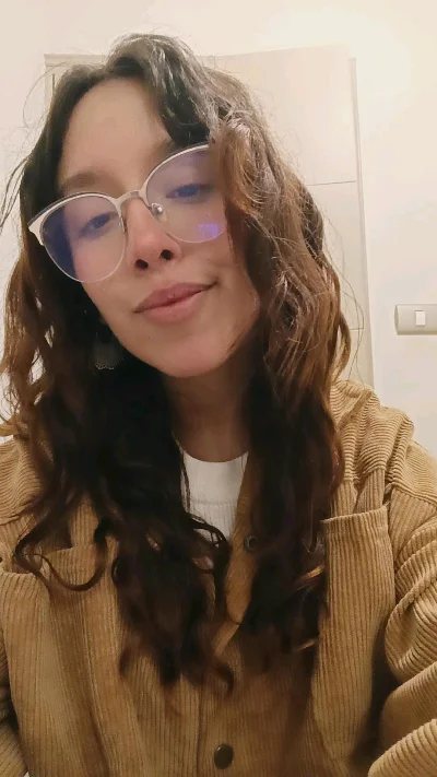 Laura E.