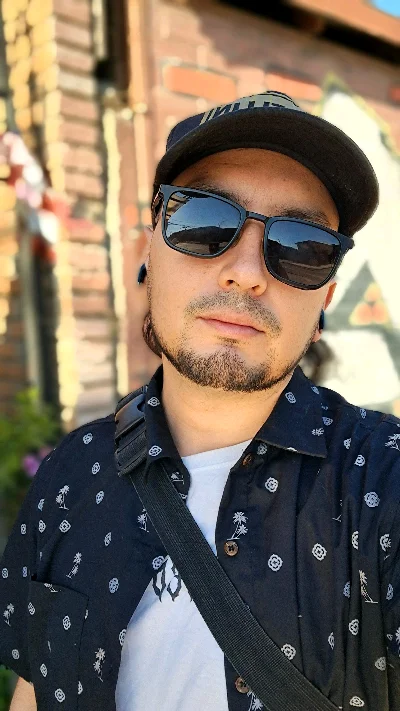 Luis E.